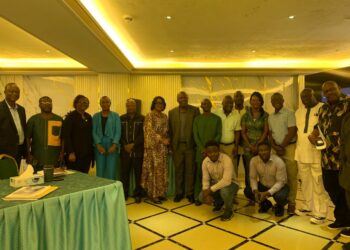 Group photo of LACRA officials, government representatives and stakeholders at oil palm regulation validation meeting in Monrovia