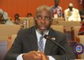 Representative Jeremiah G. Sokan speaking into a microphone during a legislative session at Liberia’s House of Representatives