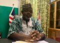 Rep. Samson Q. Wiah addressing press at Capitol Hill on alleged AFL abuse in Sinoe County