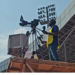 Camera operator films live sports broadcast for Intel Sports in Liberia