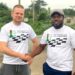 Slovak International Master Stefan Macak shakes hands with Liberia chess official during his Liberia tour