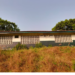 Abandoned Bomi Junior High School campus in Tubmanburg as students remain displaced amid stalled renovation.