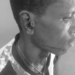 Injured victim receiving medical care after alleged ear-biting assault in Kakata, Margibi County.