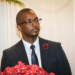 Dr. Clarence K. Moniba speaking at a formal event in Liberia