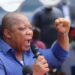 Mulbah Morlu addresses supporters as Liberia police file charges over protest