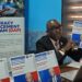 Naymote Executive Director Eddie Jarwolo presents President Meter Report on ARREST Agenda progress
