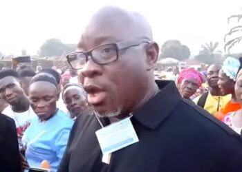 Rep. J. Marvin Cole speaks as United Methodist Church leaders warn him to stay away from the Gbarnga District Conference