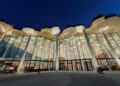 Beijing Library building at night as AI and metaverse technology enhance immersive reading experience