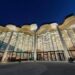 Beijing Library building at night as AI and metaverse technology enhance immersive reading experience