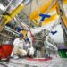 Technicians assemble a liquid oxygen-methane rocket engine at LandSpace as China expands commercial spaceflight