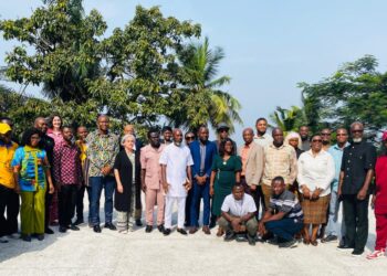 Participants pose at the closeout ceremony of the EU-funded CASTRAP cassava project in Monrovia