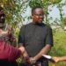 Upjit Singh Sachdeva presents cash donation to Margibi County kickball team after victory over Nimba