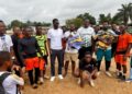 Alioune Badara Kebe with young athletes during a youth sports development program in Liberia