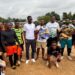 Alioune Badara Kebe with young athletes during a youth sports development program in Liberia