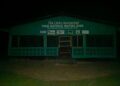 Phebe Maternal Waiting Home in Suakoko District, Bong County, pictured at night without electricity as pregnant women face years of neglect.