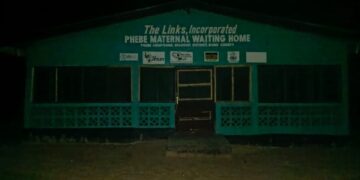 Phebe Maternal Waiting Home in Suakoko District, Bong County, pictured at night without electricity as pregnant women face years of neglect.
