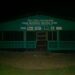 Phebe Maternal Waiting Home in Suakoko District, Bong County, pictured at night without electricity as pregnant women face years of neglect.