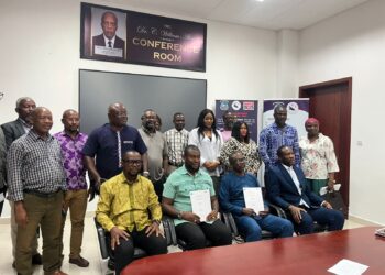 Civil Service Agency officials and National Bureau of Concessions staff pose after an in-person verification audit at the CSA headquarters in Congo Town, Monrovia.