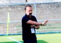 FC Fassell coach Fabio Lopez directing players during match