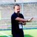 FC Fassell coach Fabio Lopez directing players during match