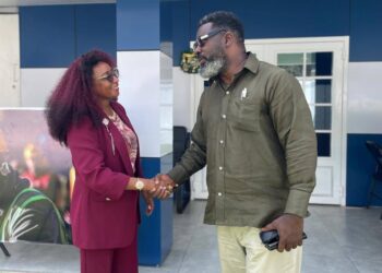 Monrovia Mayor John-Charuk Siafa meets Golden Touch Corporation CEO during tour of Compliance Center.