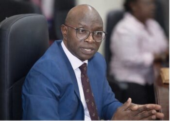 IMF Resident Representative Joel Chiedu Okwuokei meets Liberia Revenue Authority officials during training initiative launch