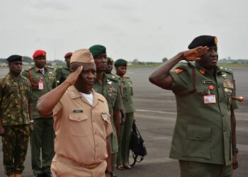 Nigerian Army Chief and AFL officers salute during Armed Forces Day ceremony