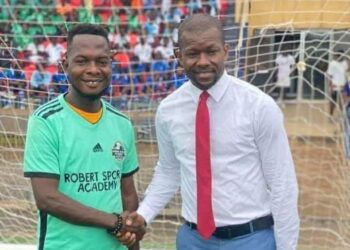 Robert Wuo Freahn and Mustapha Raji during football engagement in Paynesville