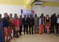 Energy sector stakeholders pose at a national workshop validating Liberia’s revised mini-grid and micro-utility regulations in Monrovia.