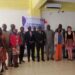 Energy sector stakeholders pose at a national workshop validating Liberia’s revised mini-grid and micro-utility regulations in Monrovia.