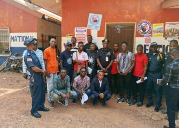 Bong County police officials and journalists pose after an acquaintance meeting aimed at strengthening media–police cooperation in Gbarnga.