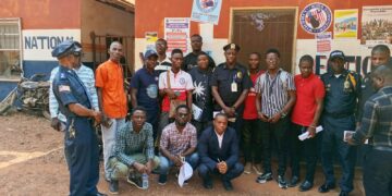Bong County police officials and journalists pose after an acquaintance meeting aimed at strengthening media–police cooperation in Gbarnga.