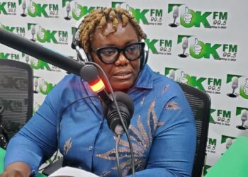 Former Public Works Minister Ruth Coker-Collins speaks during a radio interview about ministry leadership and technical standards