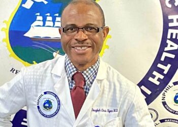 Dr. Dougbeh Christopher Nyan following Supreme Court ruling reinstating him as NPHIL director