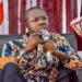 Opposition CDC Secretary General Jefferson Koijee speaking into a microphone