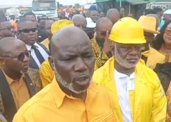 Liberian lawmakers inspect yellow road construction machines at Freeport of Monrovia