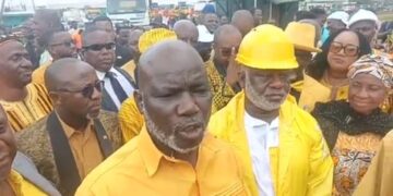 Liberian lawmakers inspect yellow road construction machines at Freeport of Monrovia