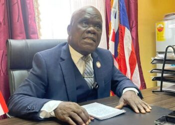 Grand Kru County Senator Numene T. H. Bartekwa speaks in his office at the Capitol Building in Monrovia.