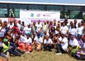Campaigners, survivors and community leaders pose at the launch of the Born Perfect Stay Perfect anti-FGM awareness caravan in Liberia.