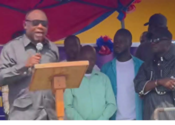 Samuel D. Tweah Jr. speaking at memorial event in Monrovia