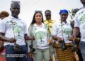EPA officials and community members plant mangroves during World Wetlands Day at the Mesurado Wetlands in Liberia.