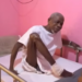 Former Chief Zoe Zanzan Karwor seated on hospital bed during illness
