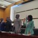Liberian senators and government officials during a hearing on the Telecom International Alliance contract and alleged procurement violations.