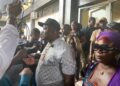 Justin Oldpa Yeazehn, known as Prophet Key, speaks to media outside the Temple of Justice