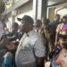 Justin Oldpa Yeazehn, known as Prophet Key, speaks to media outside the Temple of Justice