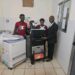 Medical staff pose with newly installed X-ray machine at C.B. Dunbar Hospital in Gbarnga, Bong County