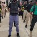Men in formation during activities linked to the National Fula Security group in Liberia