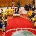 lawmakers assembled at the Executive Mansion to thank President Boakai for the bringing in the earth-moving equipment. They were all dressed in yellow