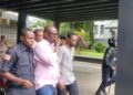 Former National Security Adviser Jefferson Karmoh being escorted from the court