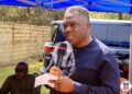 Jeremiah Koung speaking tribute Solomon George Liberia